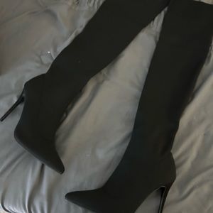 Brand new never worn black knee high boots